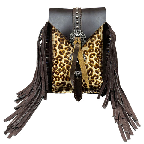 cheetah cowhide with brown fringe