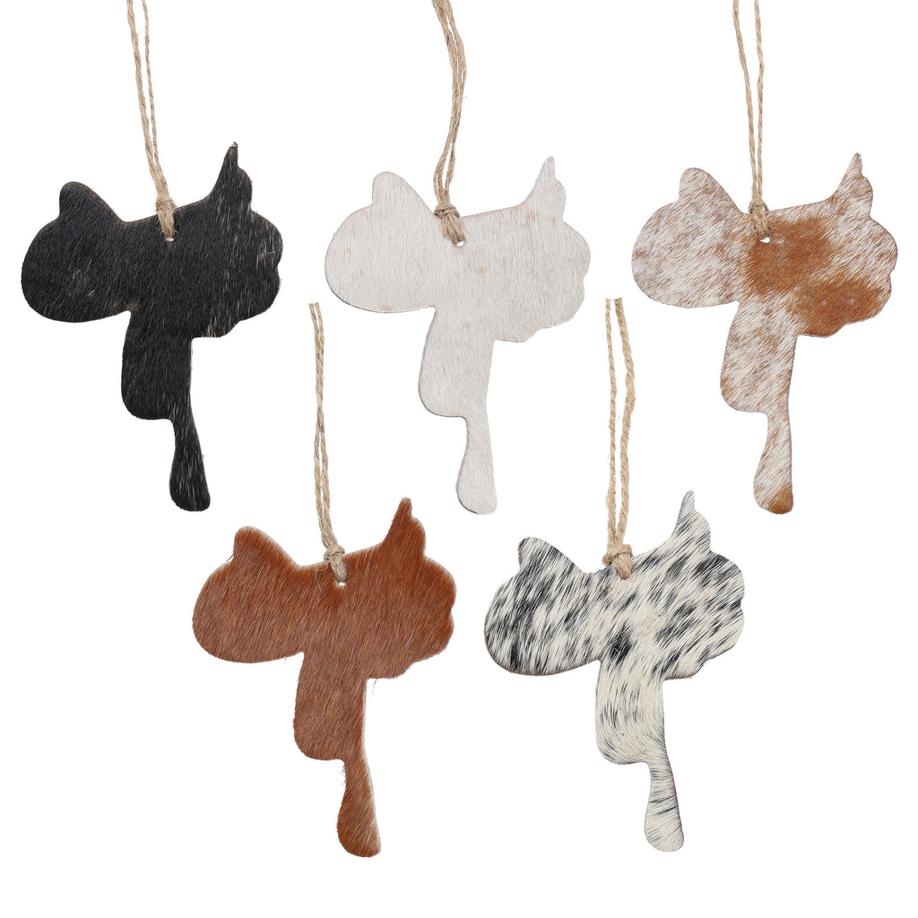 Saddle-shaped Christmas ornament made from genuine cowhide leather with unique hair-on hide pattern and rustic twine hanger