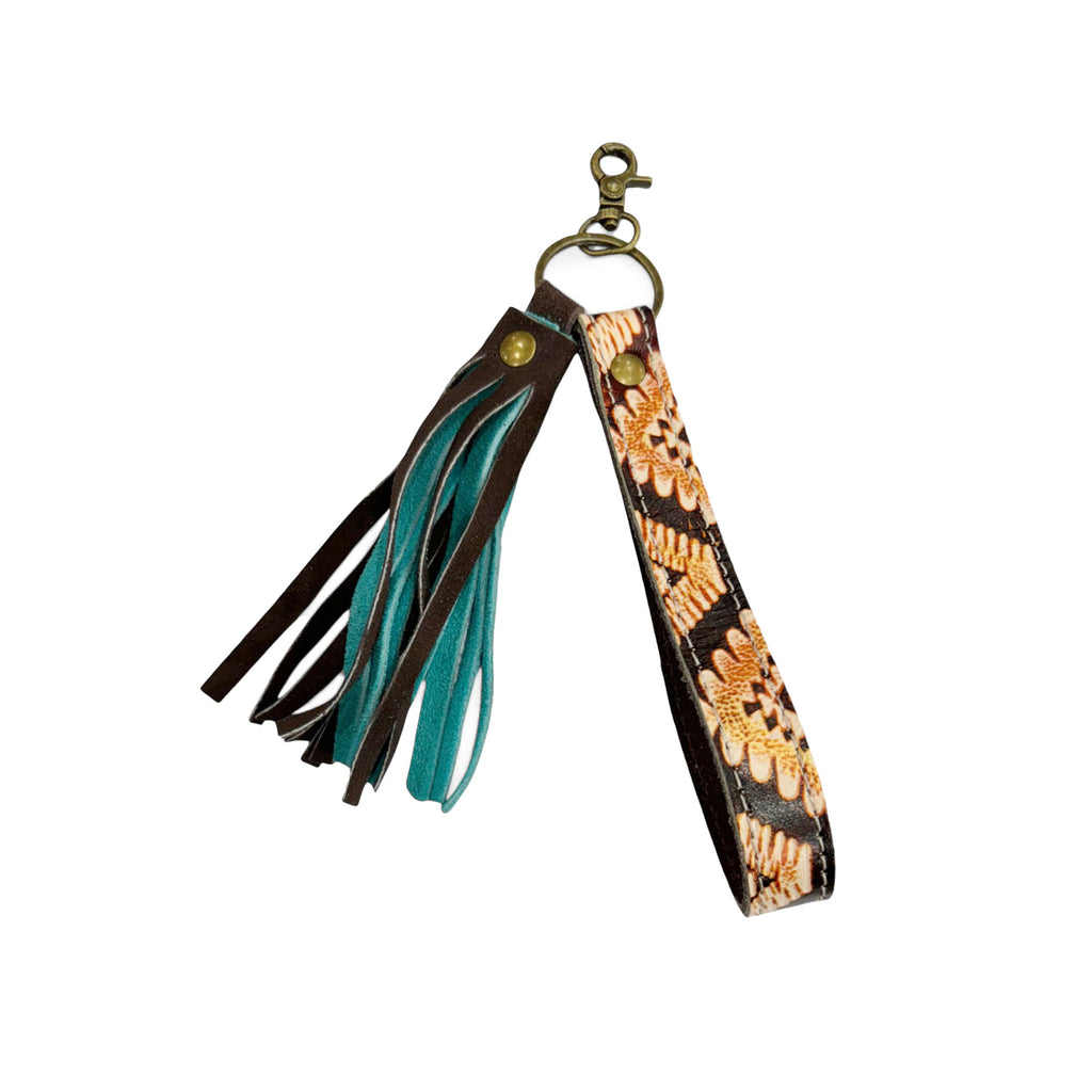 Aztec patterned leather loop key chain with brown and teal tassel