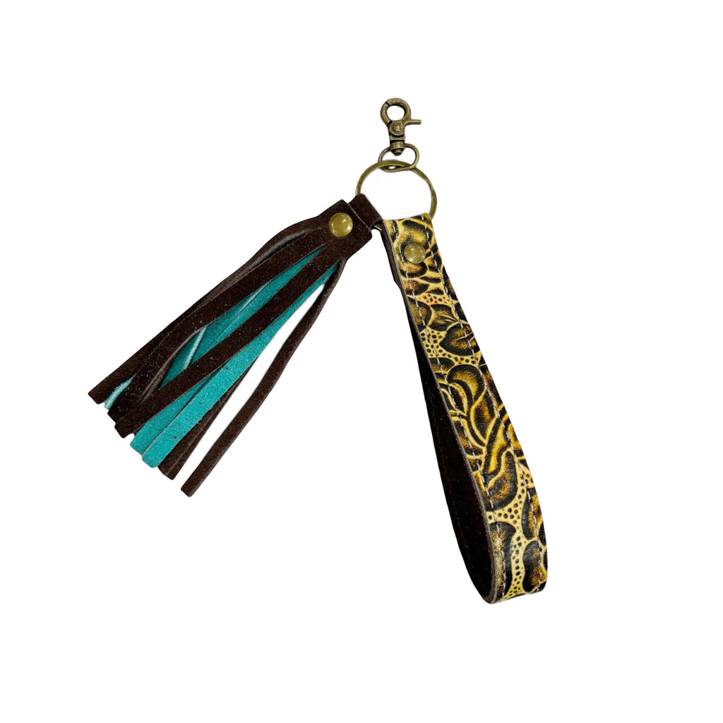 Leather loop key chain with gold tone and brown and teal tassel