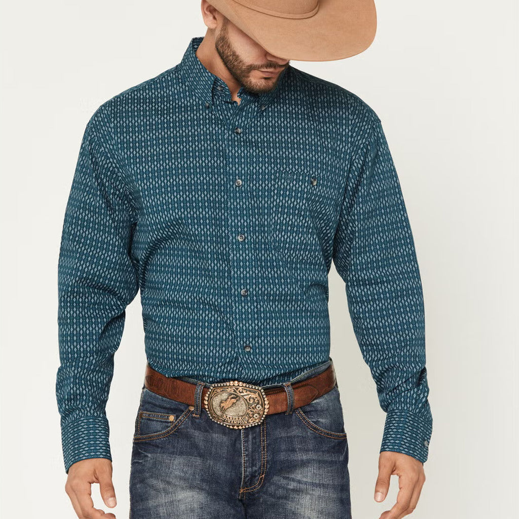 Dark teal long sleeve button down shirt with white diamond print. 