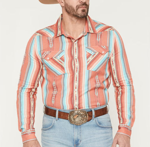 Long sleeve pearl snap shirt with double chest sawtooth pockets. Shirt is faded red, blue, and beige stripes with Aztec Prints. 