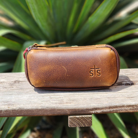 The leather Sunglasses case has a beautiful warn leather look to it. The zipper gives easy access to get your glasses safley out. 