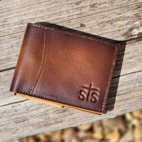 This is a beautiful bifold leather wallet by STS. Pleanty of room for all your cards and cash. 