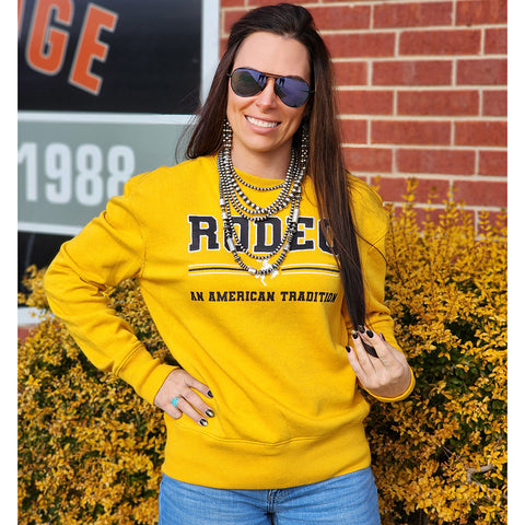 mustard color Cinch sweatshirt with Rodeo on the front 