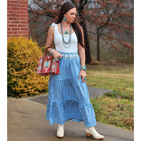 Denim skirt with pockets that has white stripes mid calf length