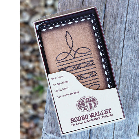 Brown roughout wallet with a boot stitch design in the center in chocolate thread. White diamond lacing
