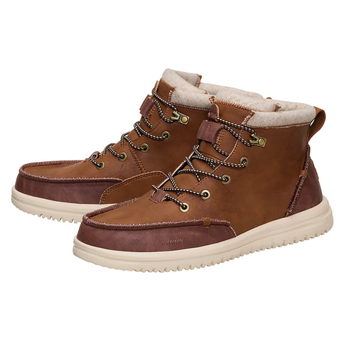 Pair of Hey Dude Men’s Bradley Cognac Tumbled Boots shown side by side, highlighting the tumbled leather texture, moc‑toe shape, and lightweight outsole.