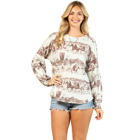 Cream and brown Western scene long sleeve top with desert print featuring longhorns and cowboy silhouettes