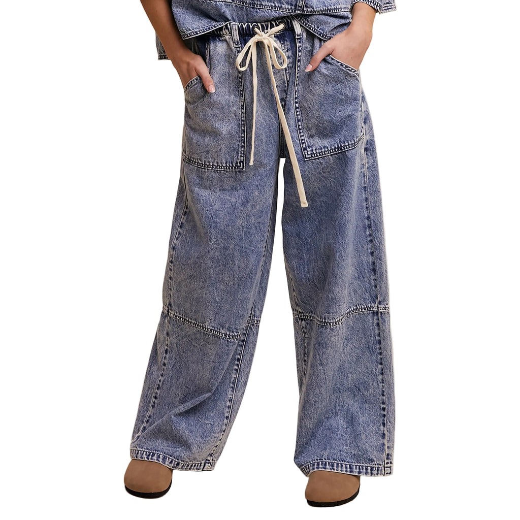 Model wearing Wide‑Leg Denim Drawstring Pants, showing the relaxed fit, soft denim texture, and adjustable drawstring waist.