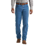 Model wearing the Wrangler Men’s 20X Relaxed Fit Jean showing the relaxed thigh, straight‑leg fit, and classic medium‑blue wash.