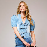 Garment-washed denim top featuring puff sleeves and a tie-front detail