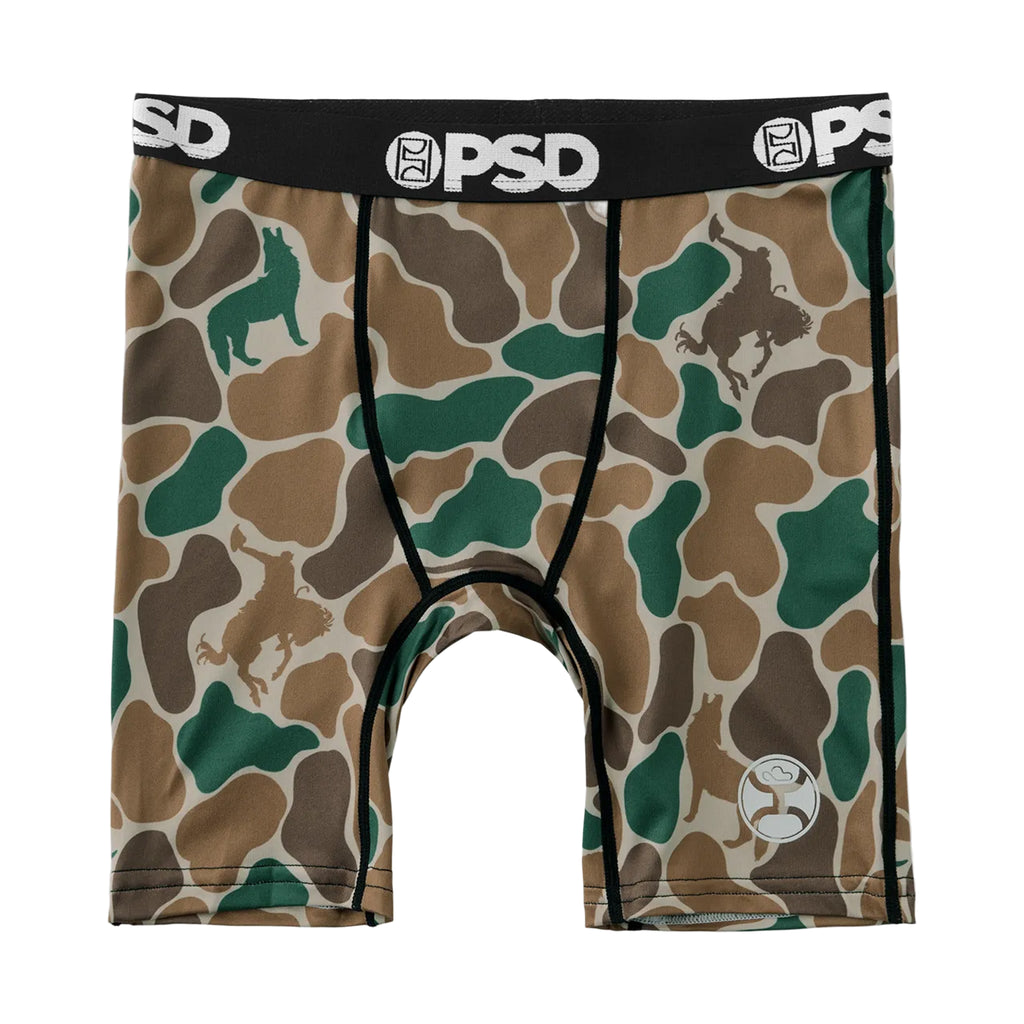 Close-up of roping cowboy and coyote graphics on PSD x Hooey Duck Camo youth boxer briefs