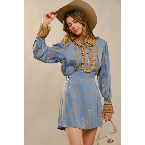 Woman wearing a Western Graphic Ruffle Tie Waist Mini Dress Touching her hat