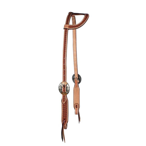 Brown leather headstall with decorative metal buckle on a white background