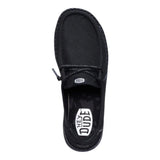 Women's black slip-on casual shoes with subtle shimmer effect