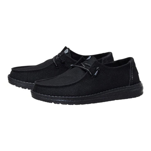 Women's black slip-on casual shoes with subtle shimmer effect