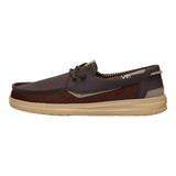 men's dark mole brown colored shoe with mesh sides and tan colored bottoms 