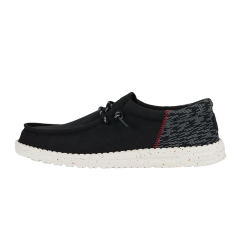 Black shoe with Black and white heel. White sole. 