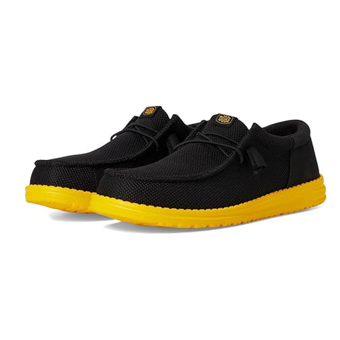 men's low top black sneaker with yellow bottom