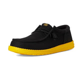 men's low top black sneaker with yellow bottom