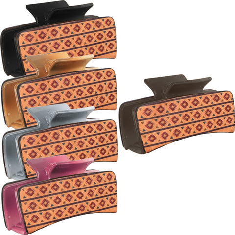Plastic claw clip with leather on the sides that have diamond Aztec designs.