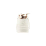 Back view of the Hey Dude Women’s Karina Double Duo Classic Egret shoe on a white background showing the white and metallic heel.