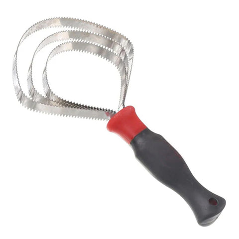 Diagonal view of red and black reversible curry comb. 