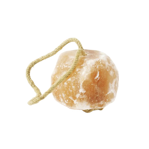 Rock salt block with rope. 