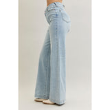 comfort-stretch light blue denim jeans with Criss cross high waist, wide leg and zip fly-side view