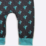 Black Romper with Turquoise Cactus Print Leg View