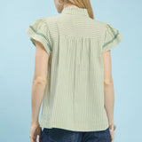 Back view of model wearing the sage striped scalloped trim flutter sleeve top showing the scalloped edge and relaxed fit.