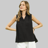 Black V neck sleeveless shirt with a popped collar. 