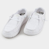 Women's light weight white slip-on shoe with crochet upper and white soles