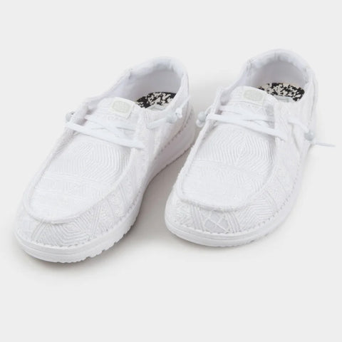 Women's light weight white slip-on shoe with crochet upper and white soles