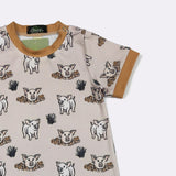 Sleeve close up showing the playful pig and mud print