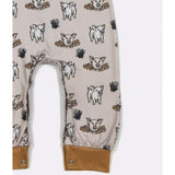 Leg close up showing the playful pig and mud print and snap bottom