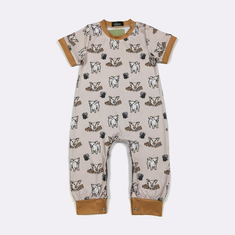 Front view, showing the playful pig and mud print and the soft, comfortable one‑piece fit.
