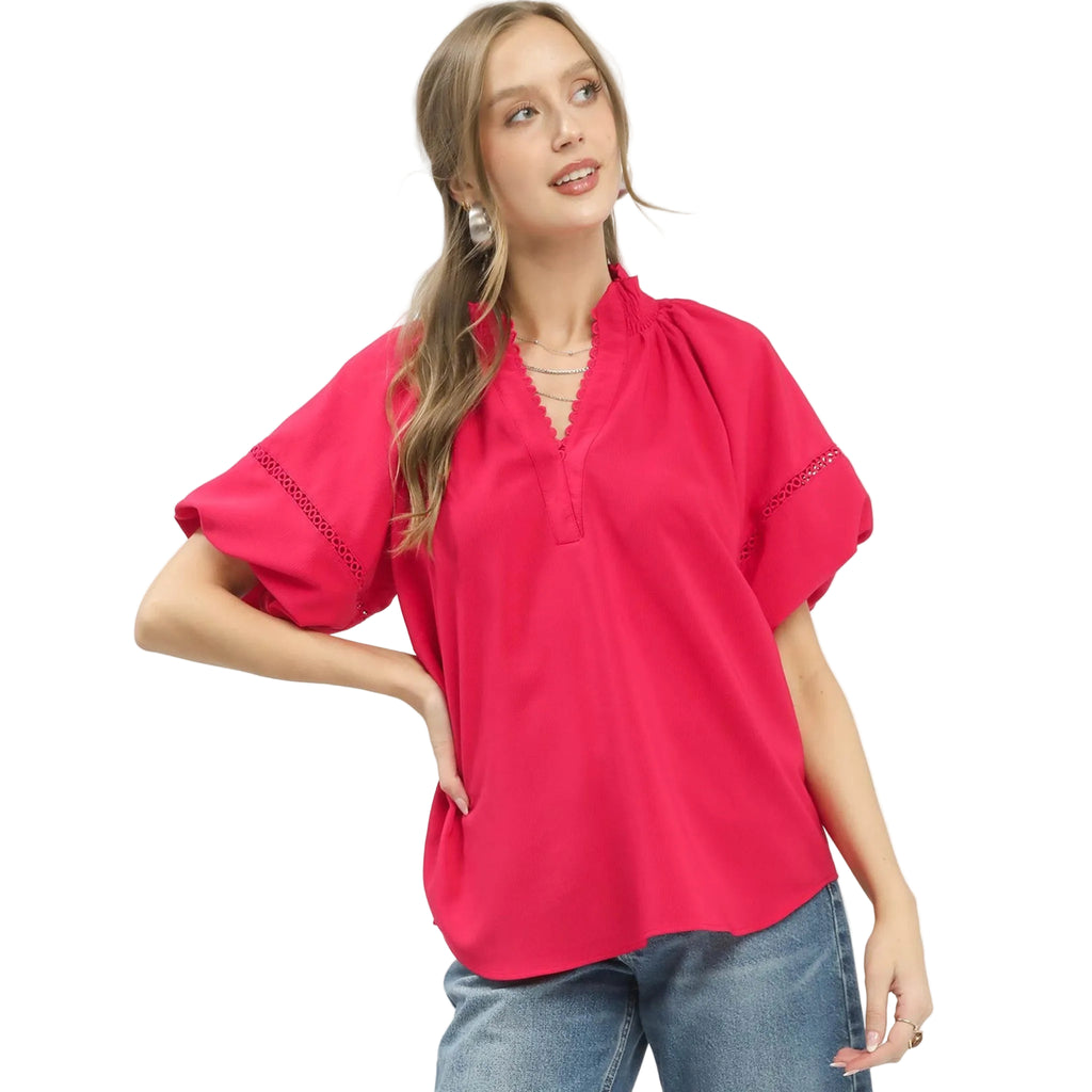 Woman wearing the Teaberry Lace Trim Peasant Top, front view showing the lace trim detail and flowy peasant silhouette