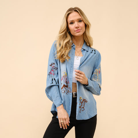 Denim long sleeve shirt with colorful embroidered cowgirl designs. 