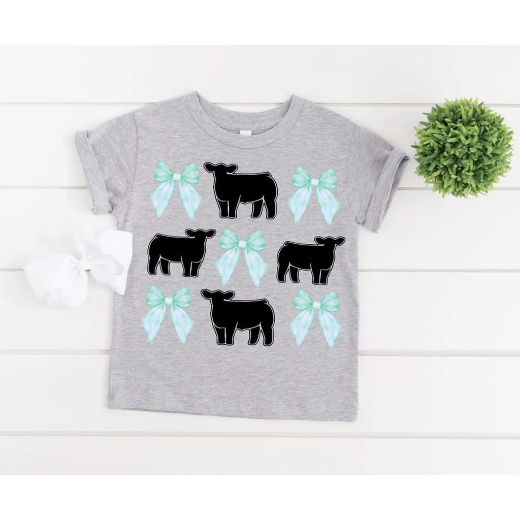 Gray Kid's  t-shirt with black cow and light blue bow designs on a white background