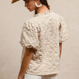 Back side view of Oat Floral Textured Balloon Sleeve Shirt 