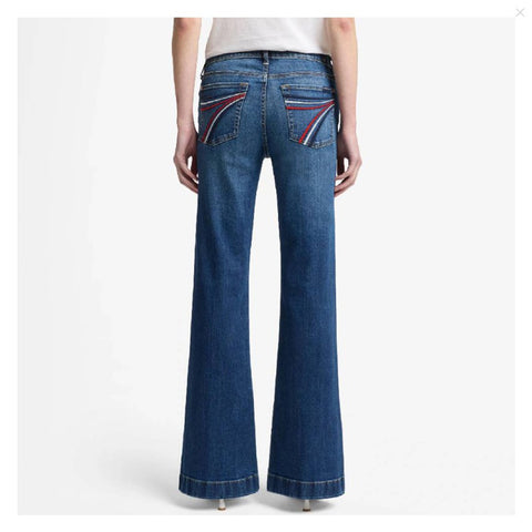 Seven for all Mankind red, white, and blue stitched 7 pocket jeans. Back view.