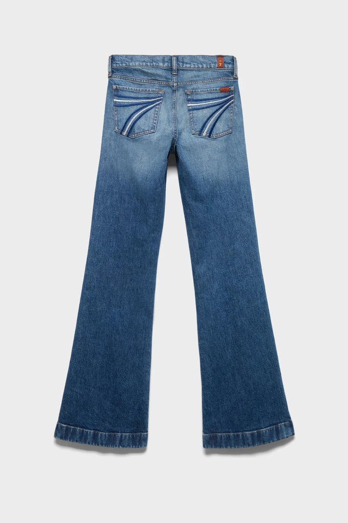 Back view of DOJO mid-wash jeans with embroidered back pockets and wide-leg silhouette.