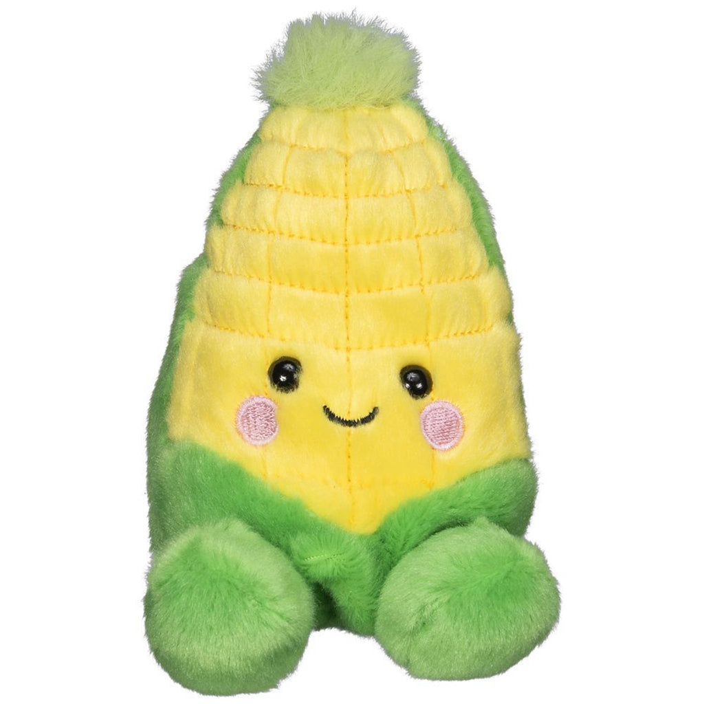 Wavey Corn Palm Pals plush toy with golden yellow body, stitched smile, rosy cheeks, and soft green tuft and feet.