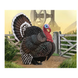 strutting male turkey puffed out vinyl toy in a fenced in area