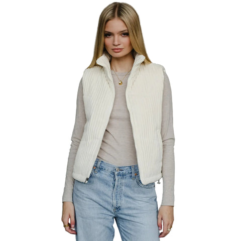 Model wearing cream colored vest fully open.