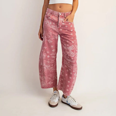 Faded red bandana print barrel jeans.