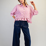 Front view of shirt, it has a boxy, oversized fit. 