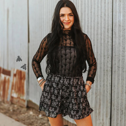 Black see through top with black stitched lariat designs 